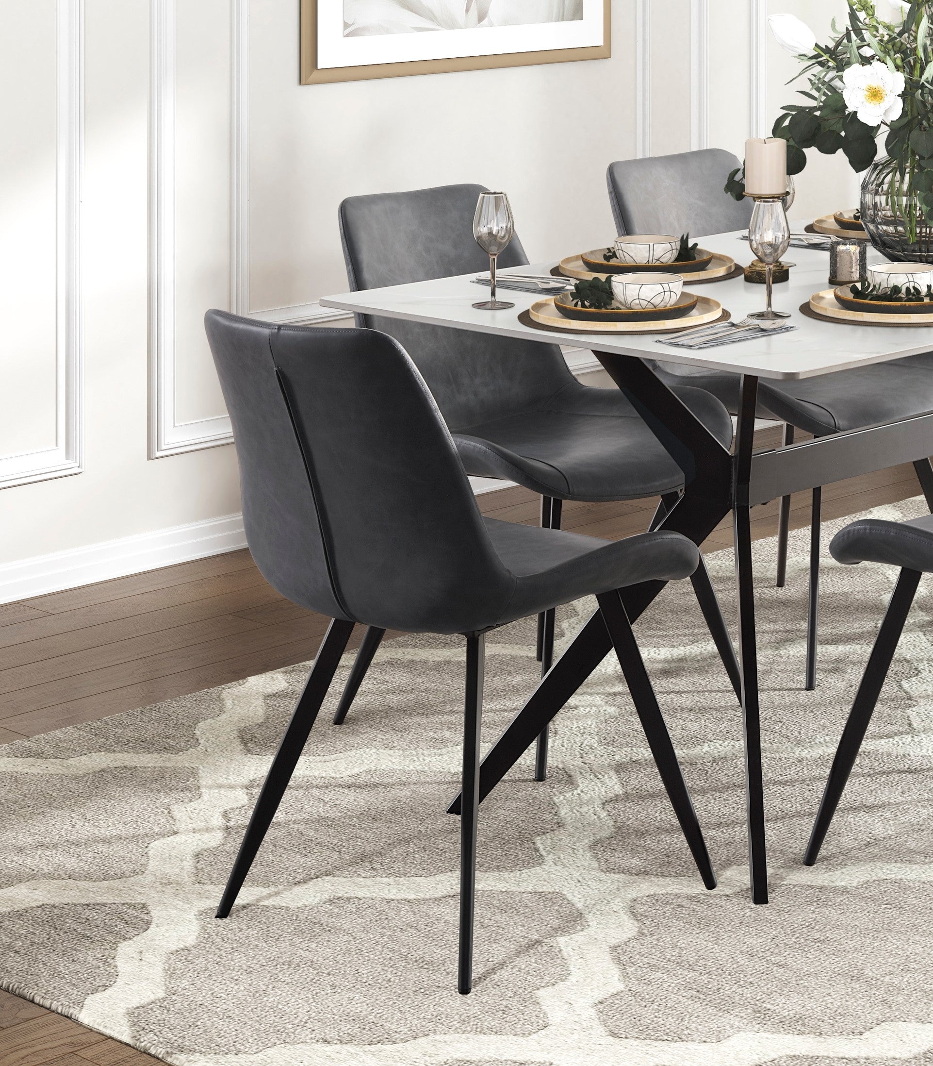 Dark grey faux leather dining chair with black metal legs modern style