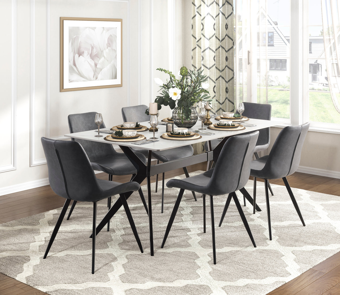 Modern white dining table with grey upholstered chairs set for six