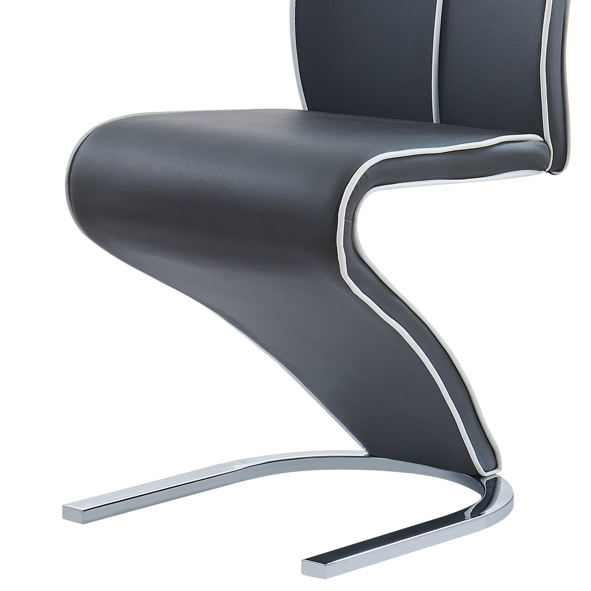 Dark grey faux leather cantilever dining chair with chrome base and white trim