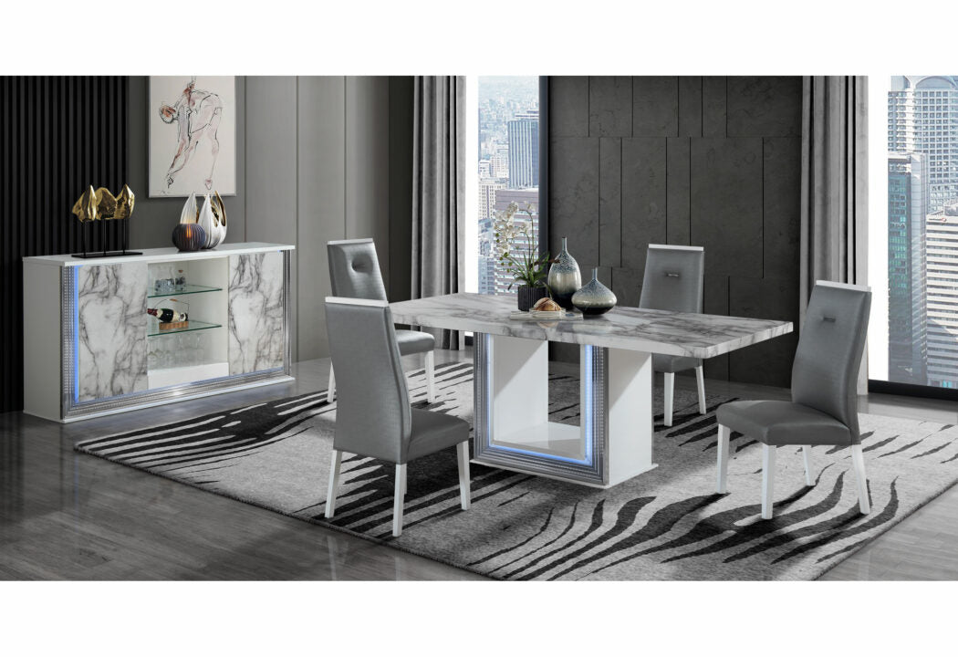 Modern marble top dining table with white base and LED lighting seats four
