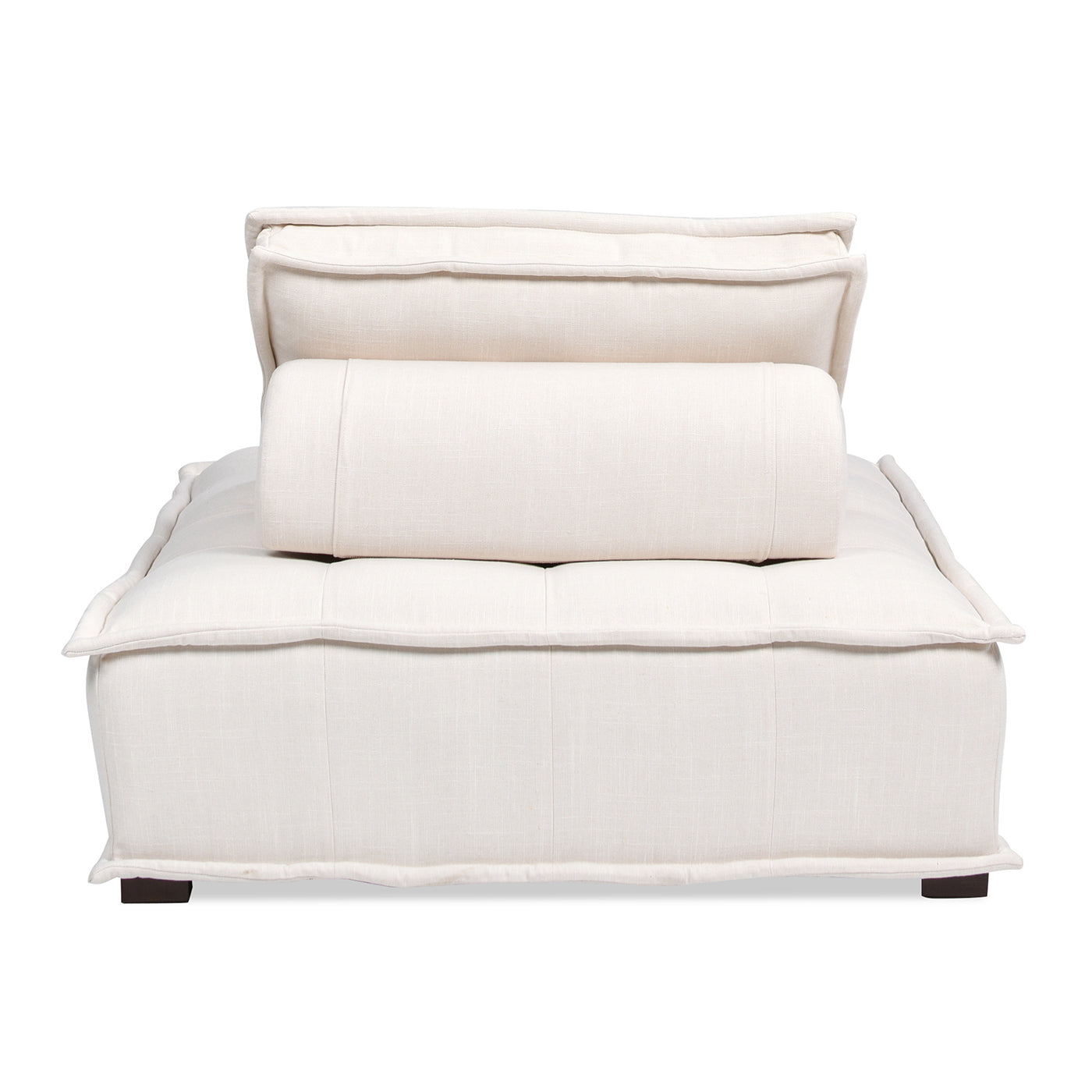 Cream linen modular sofa unit with bolster pillow and tufted base perfect for modern living rooms