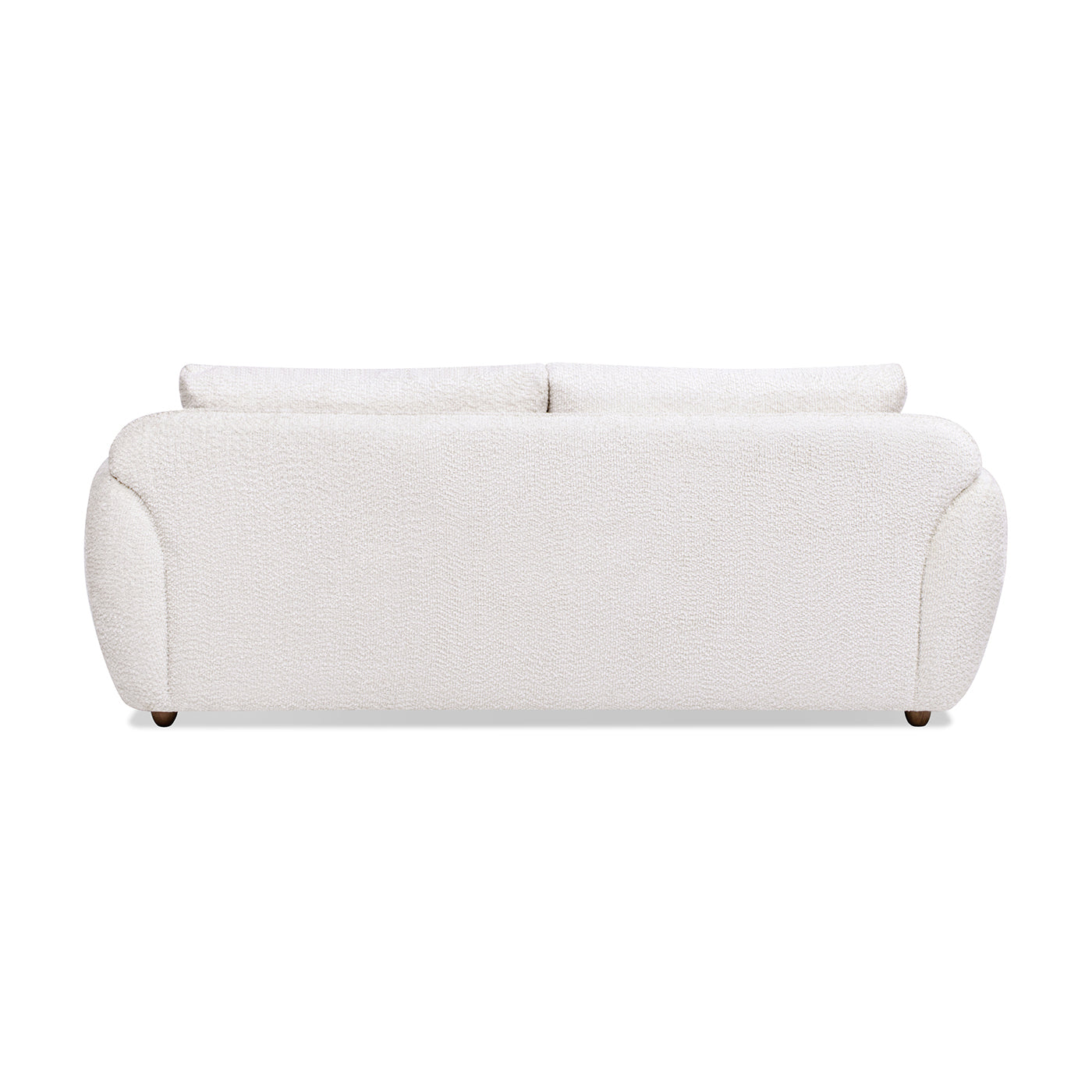 White boucl fabric sectional sofa with curved arms and dark wood legs