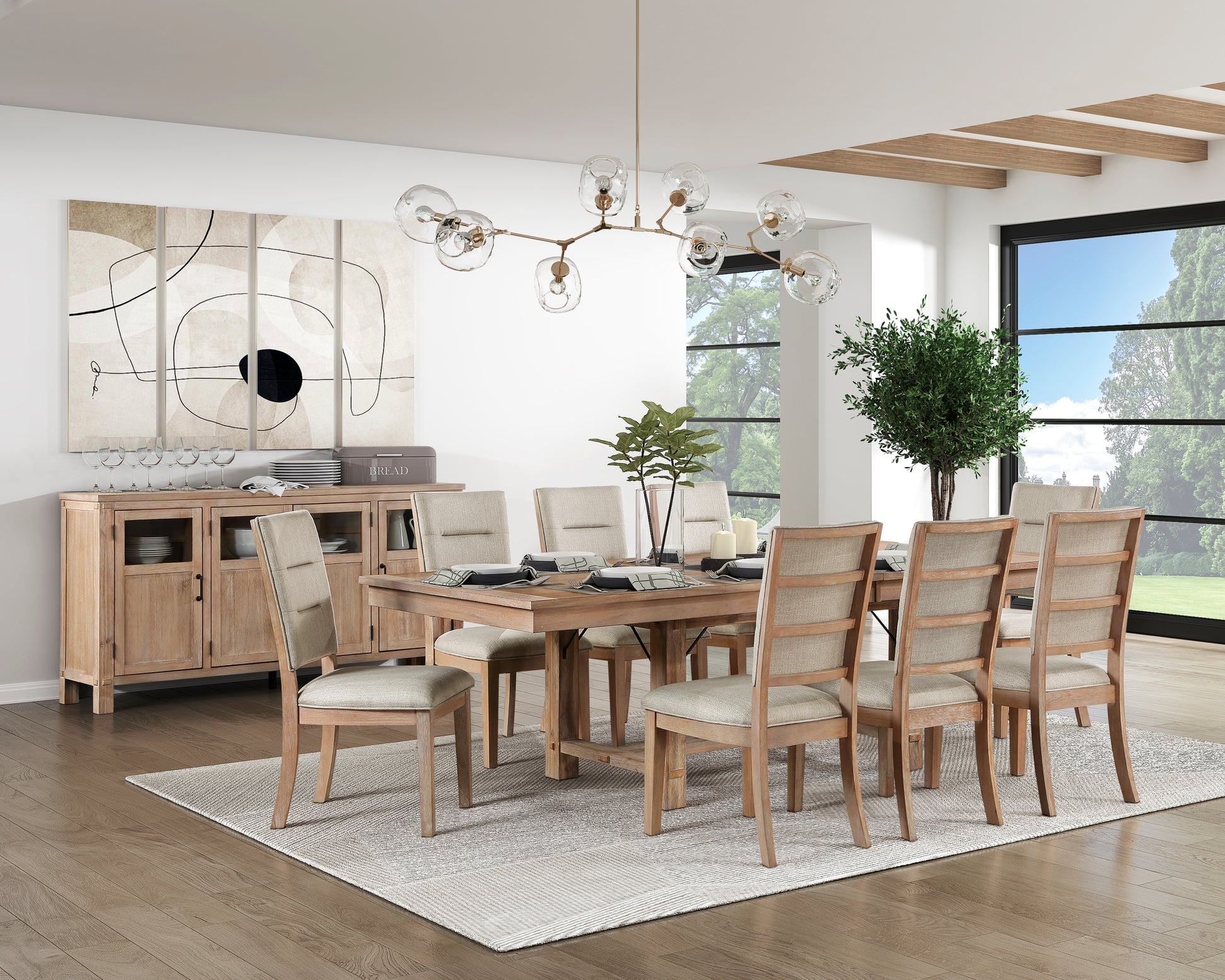 Modern farmhouse dining table with eight upholstered chairs in a bright dining room setting
