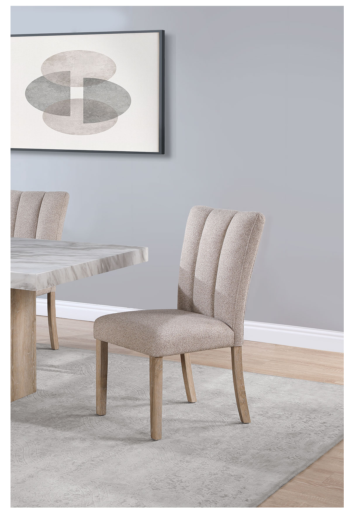 Beige upholstered dining chair with vertical channel tufting and light wood legs