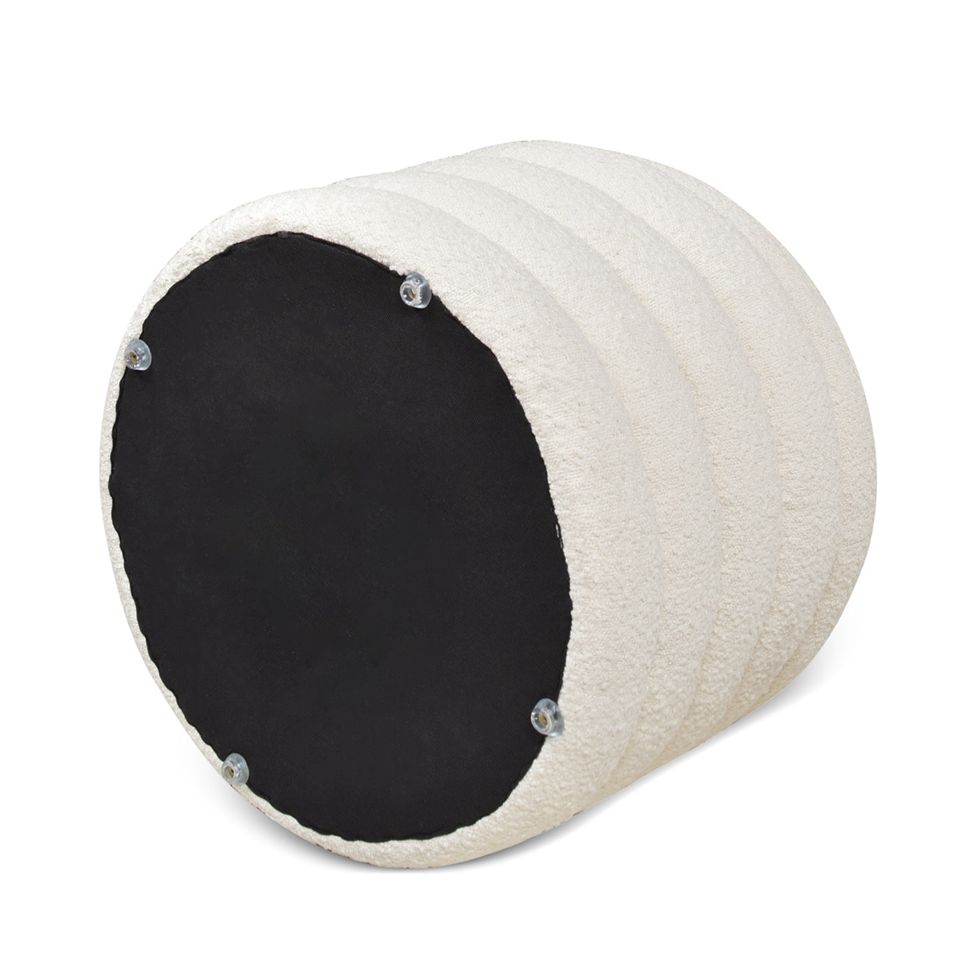 Cream boucle fabric ottoman with ribbed design showing underside with protective feet