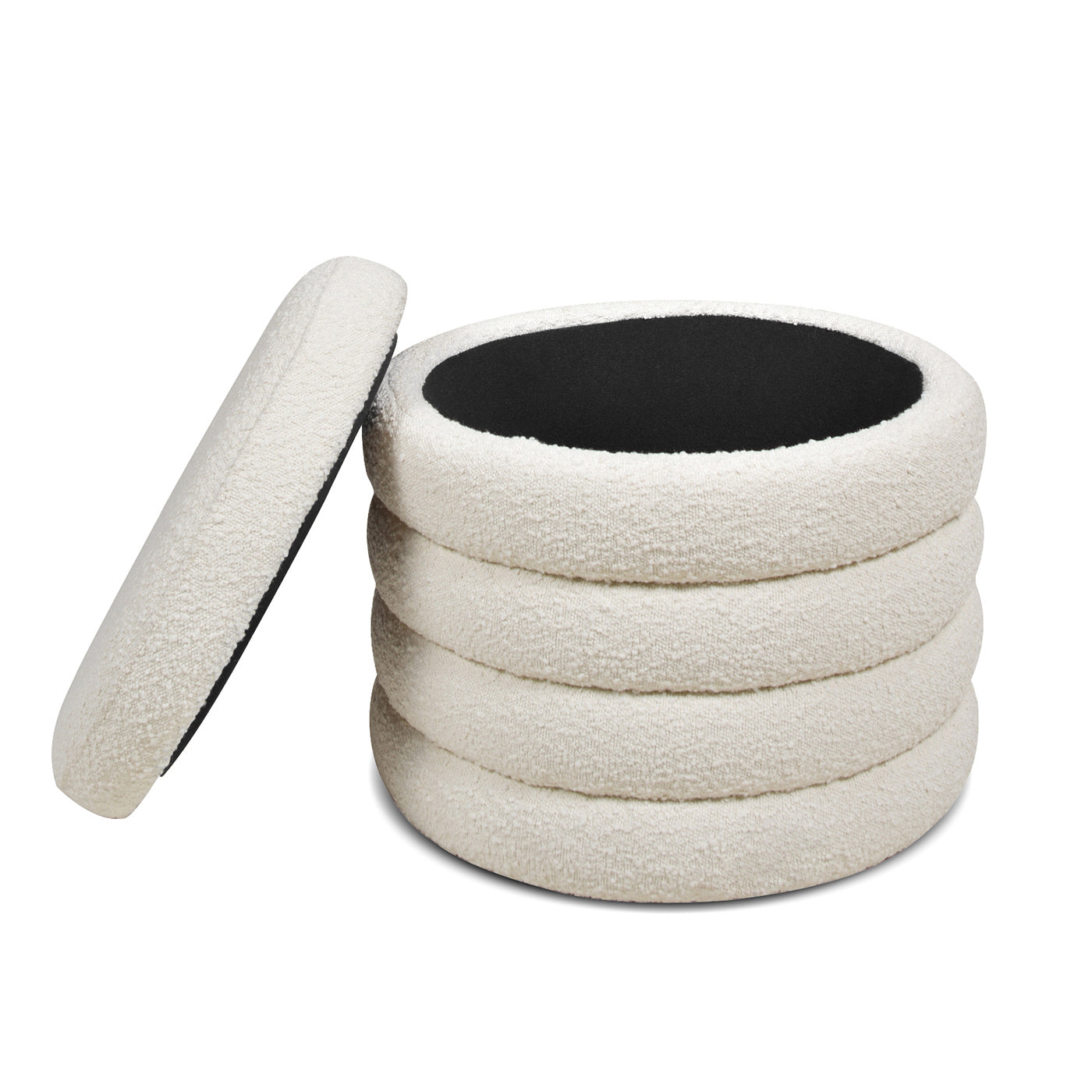Stack of five cream boucle round ottomans one lid detached