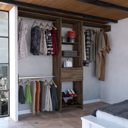 Dark wood closet with hanging clothes and shoes