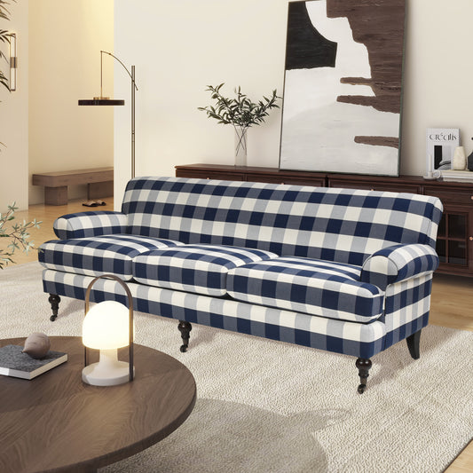 Navy and white buffalo check sofa with rolled arms and dark wood legs