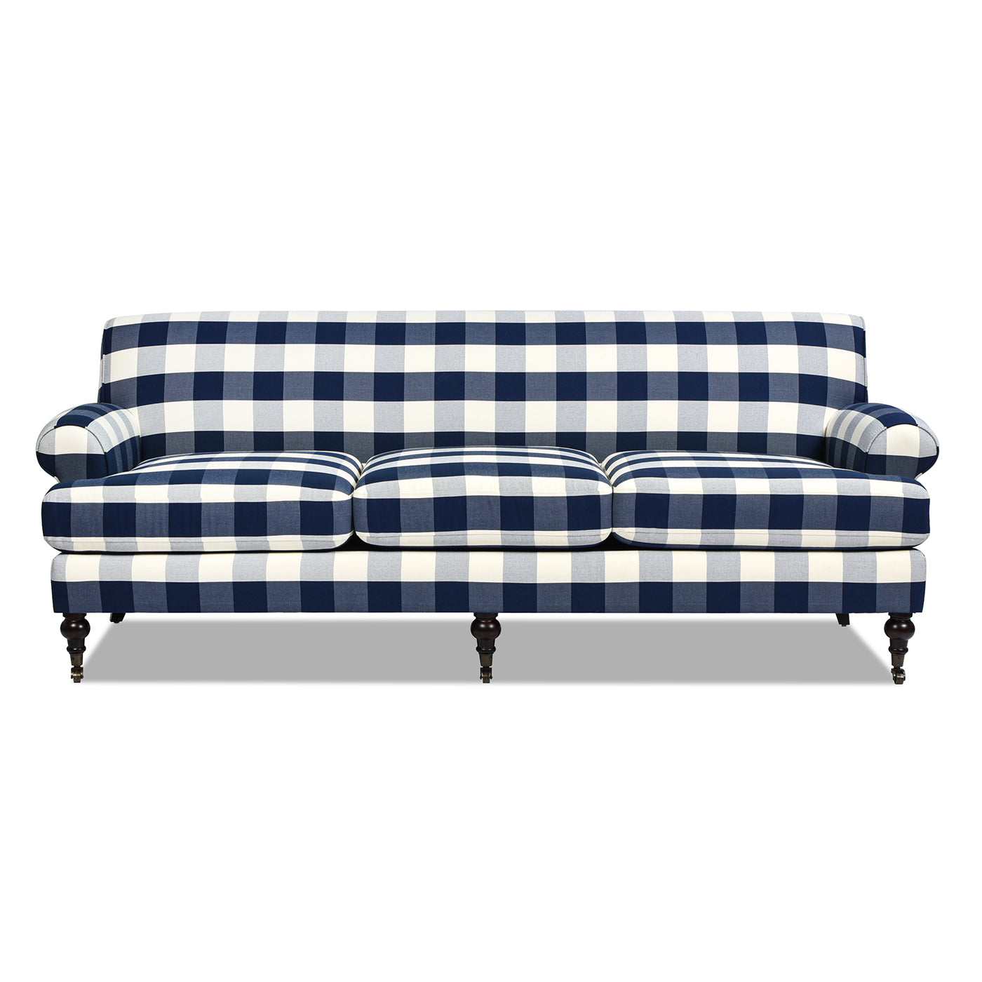 Classic navy and white gingham sofa with plush cushions and turned wooden legs