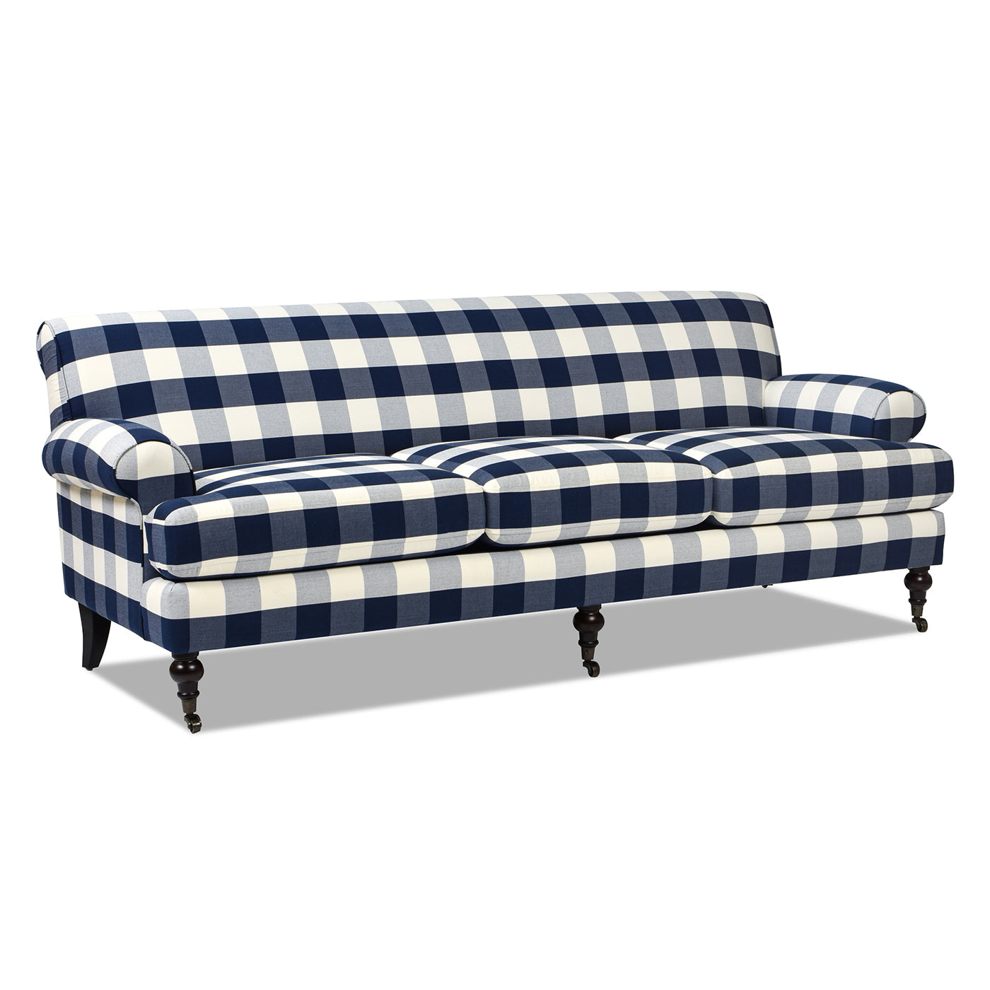 Navy and white buffalo check upholstered sofa with rolled arms and dark wood legs