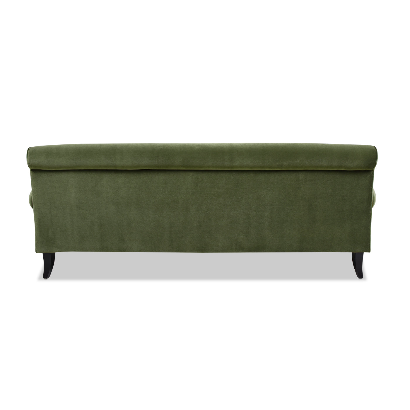 Back view of a plush green velvet sofa with dark wood legs