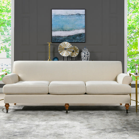 Plush cream fabric sofa with three cushioned seats and rounded arms perfect for a living room