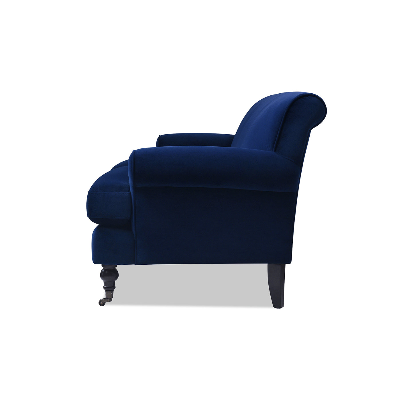 Navy blue velvet armchair with scroll arms and dark wooden legs with casters