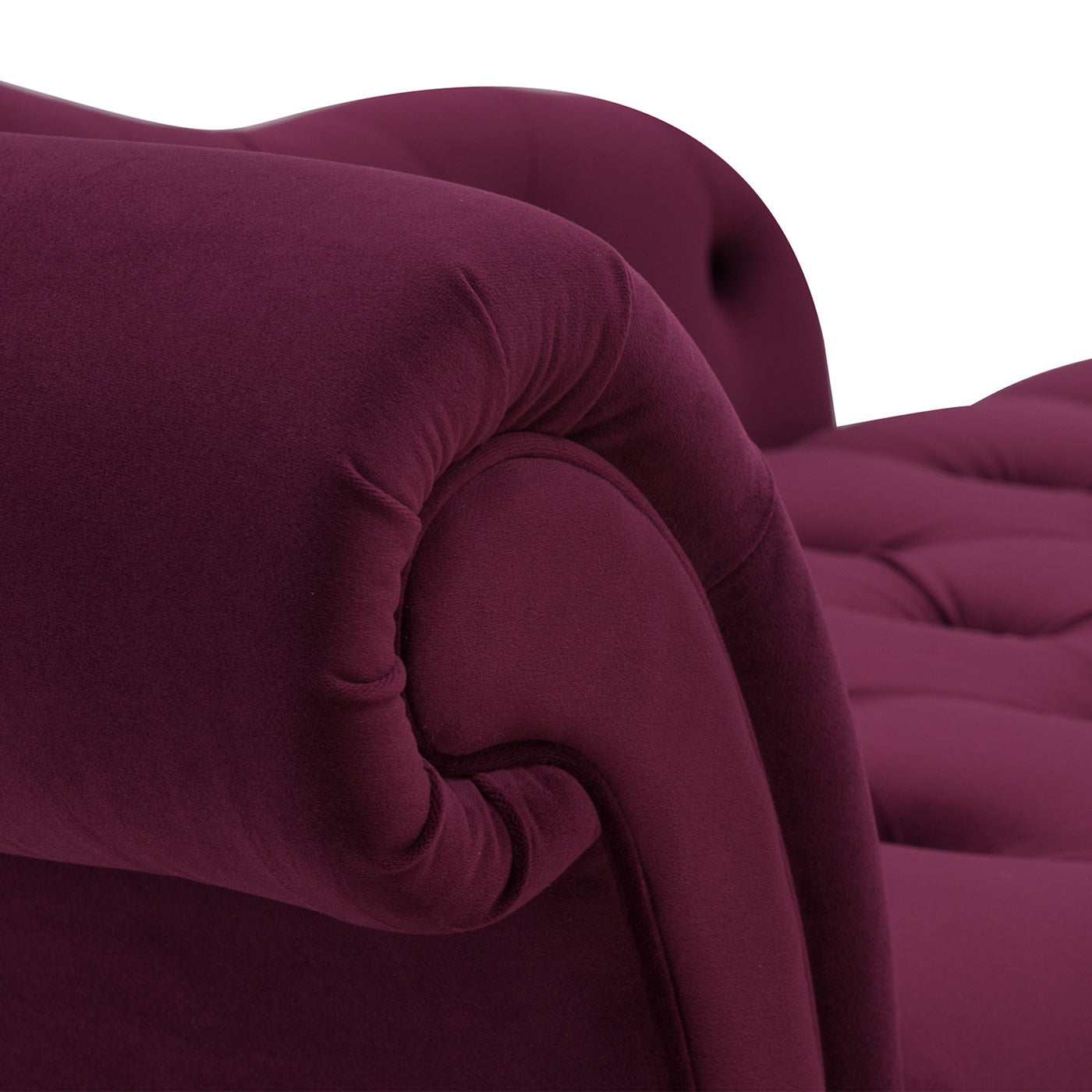 Plush burgundy velvet armchair armrest with tufted detailing perfect for a luxurious living room accent