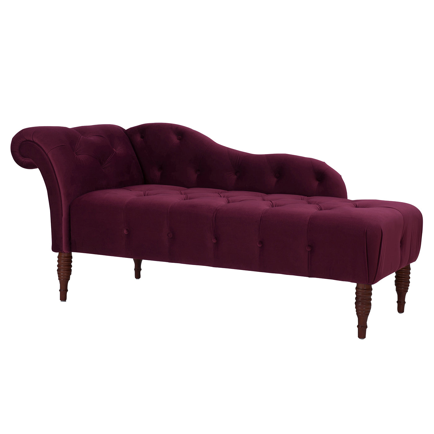 Deep plum velvet chaise lounge with button tufting and rolled armrest for luxurious relaxation