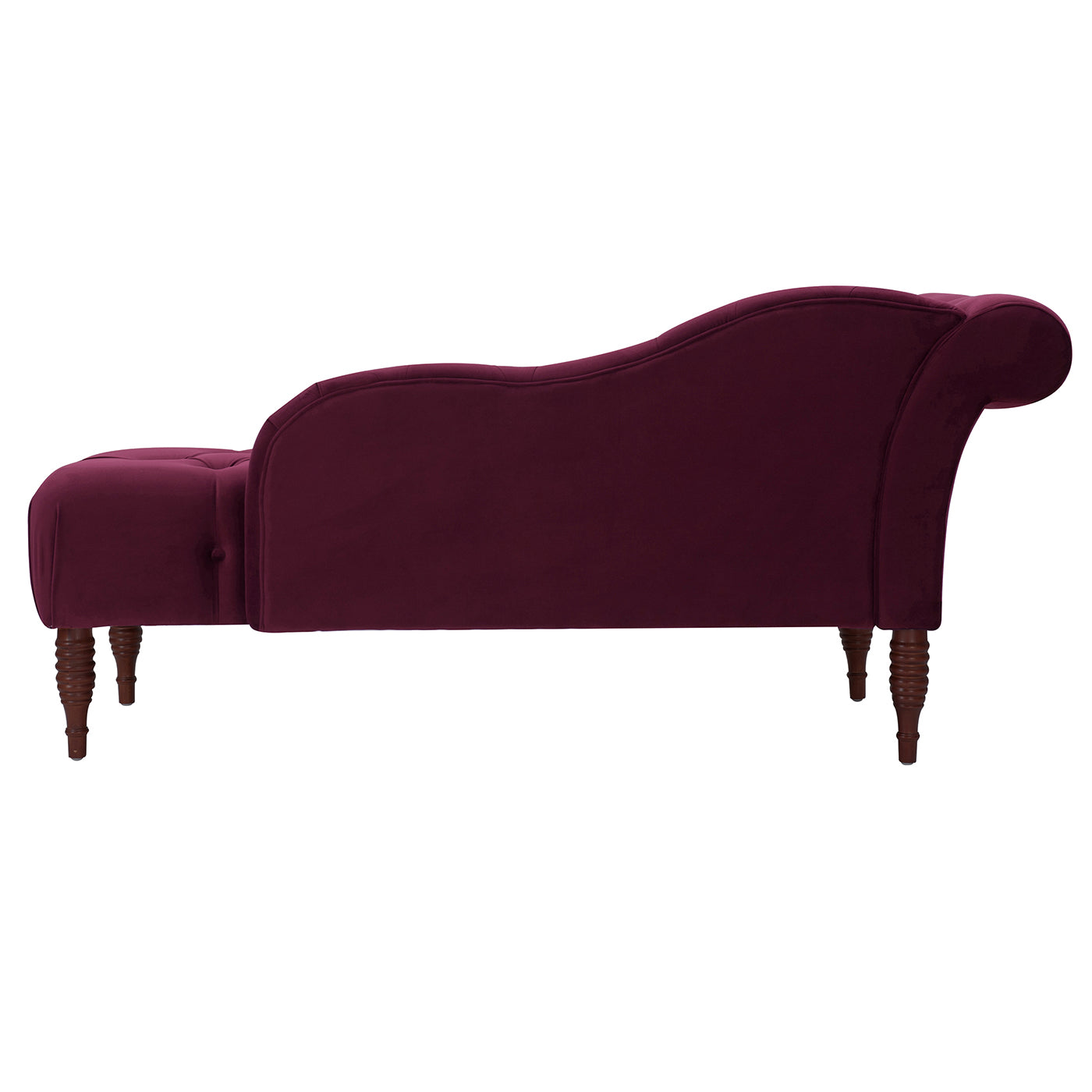 Deep purple velvet chaise lounge with button tufting and wooden legs