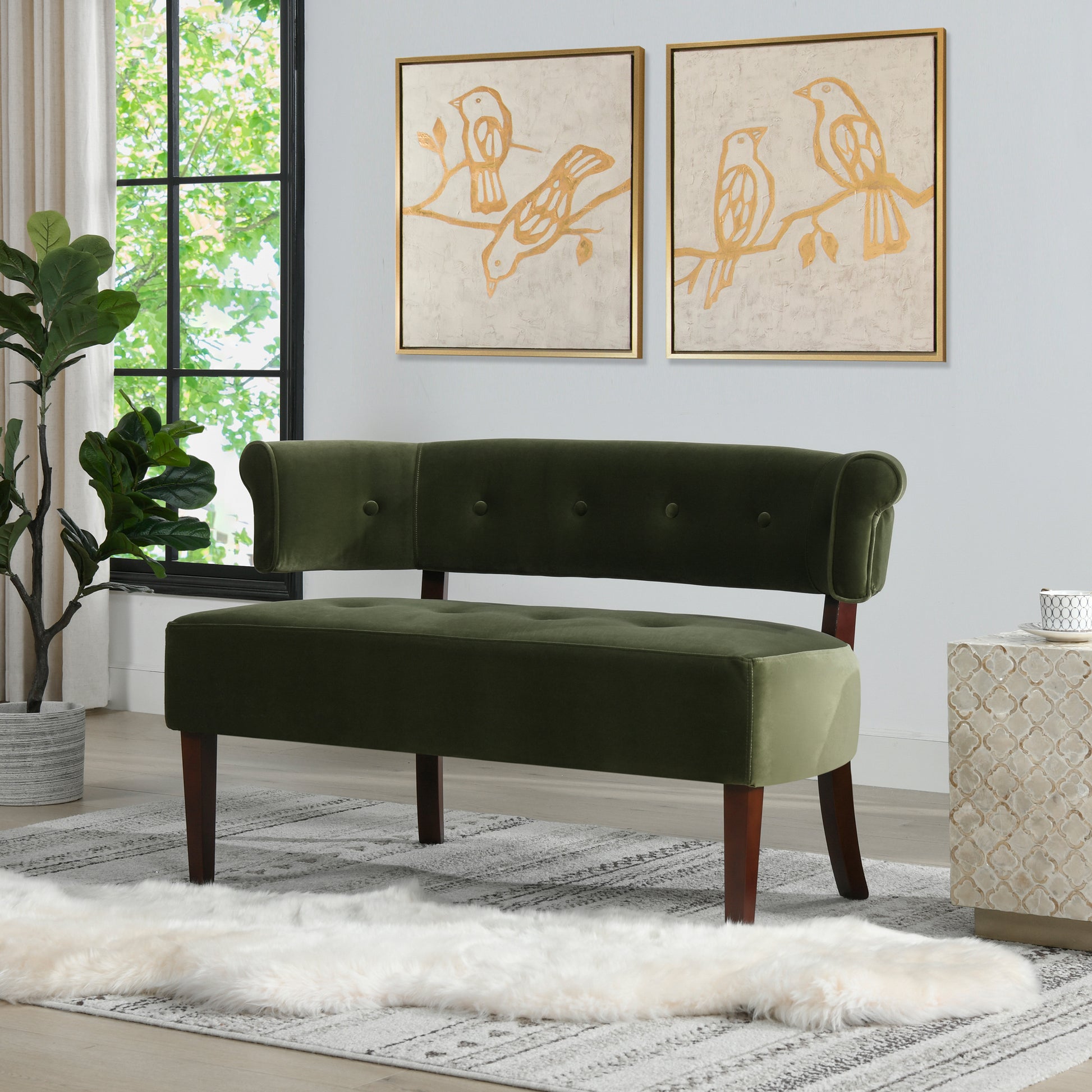 Deep green velvet tufted bench with dark wood legs for a stylish entryway seating