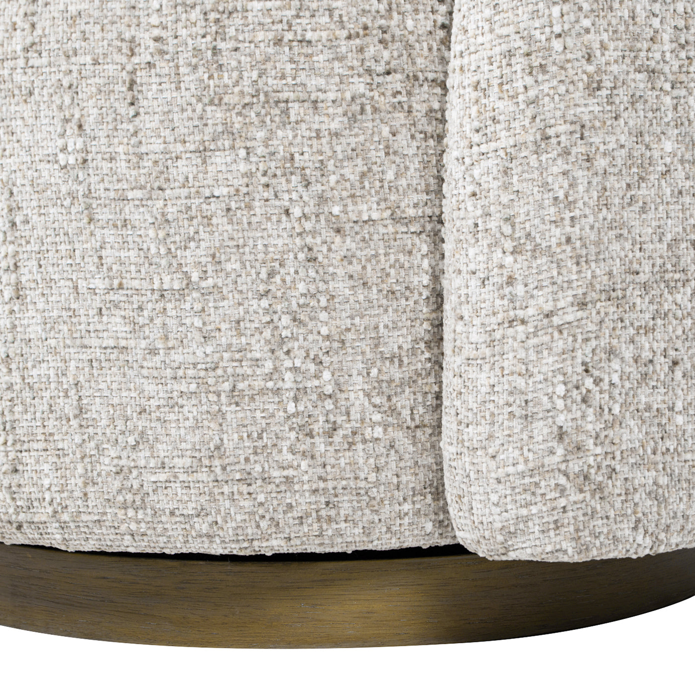 Closeup of a textured linenblend fabric in beige showing weave detail on a round pouf