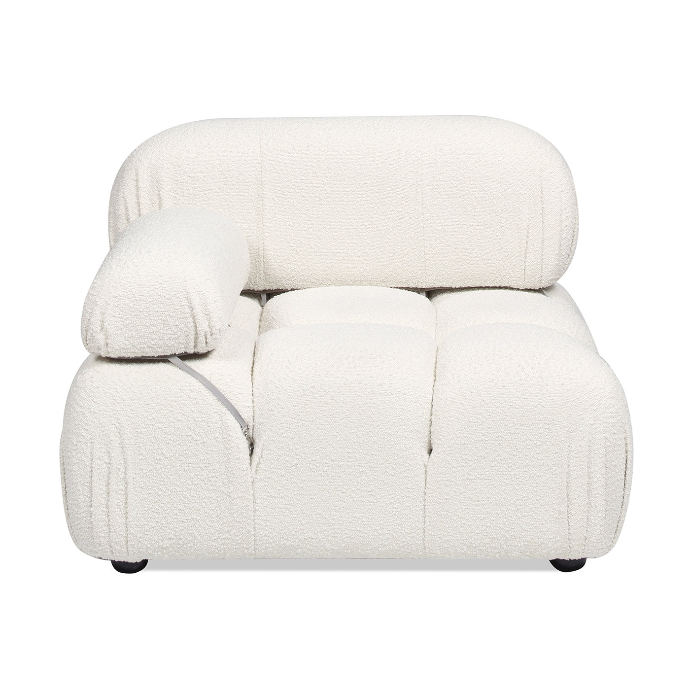 Plush cream boucl modular armchair with a rounded silhouette and deep seat cushions