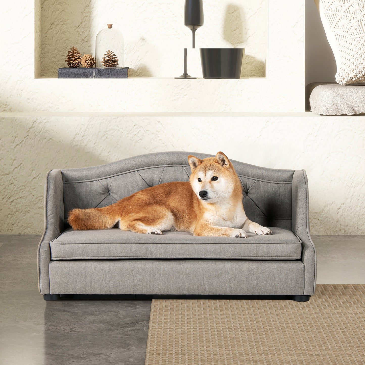 Gray tufted fabric dog bed sofa with cushioned seat and arched back