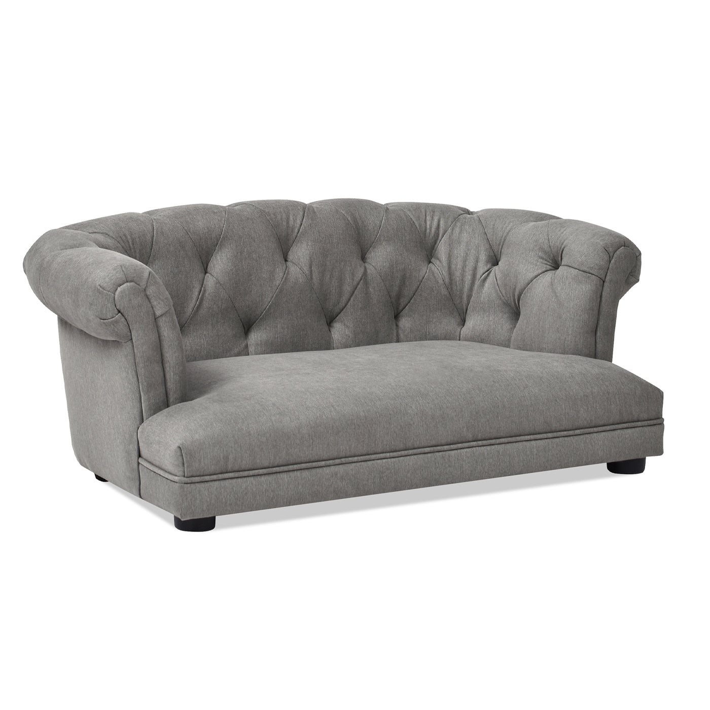 Grey fabric tufted sofa with curved arms perfect for a cozy living room