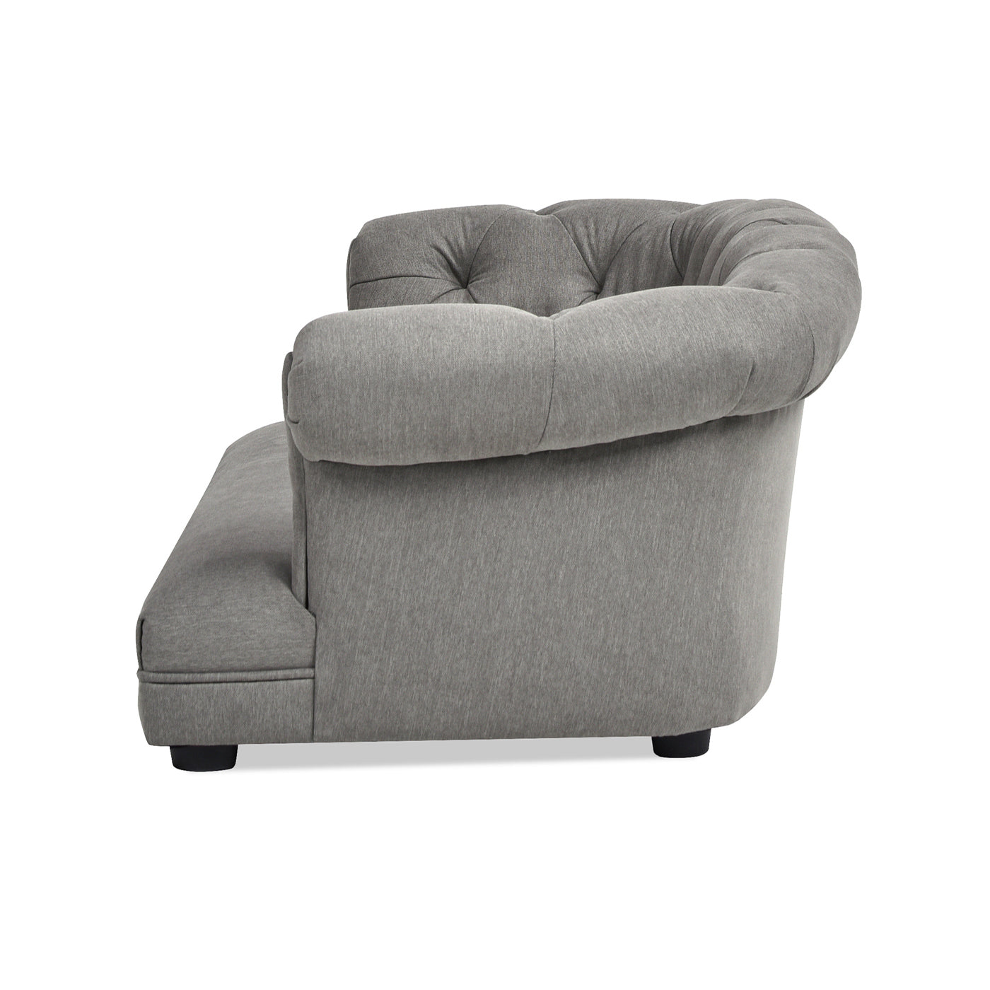 Gray fabric chesterfield sofa with tufted backrest and rolled arms