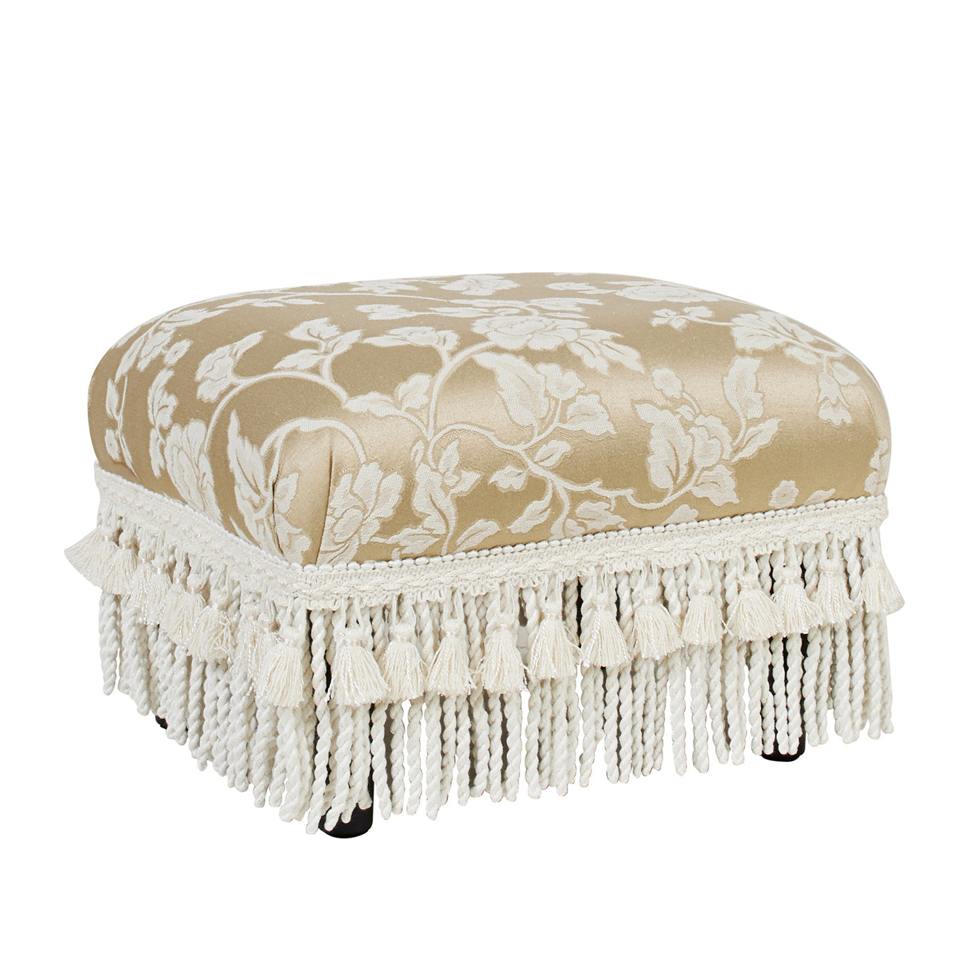 Gold floral print ottoman with white fringe and tassels