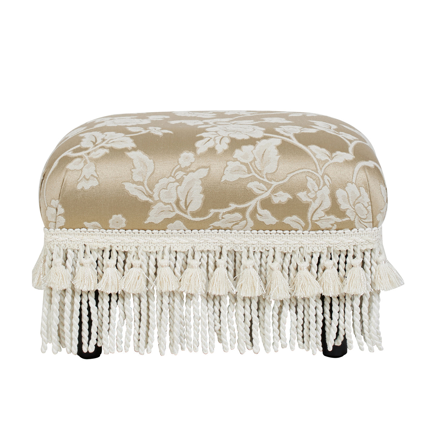 Champagne floral jacquard ottoman with ornate tassel fringe and dark wood legs