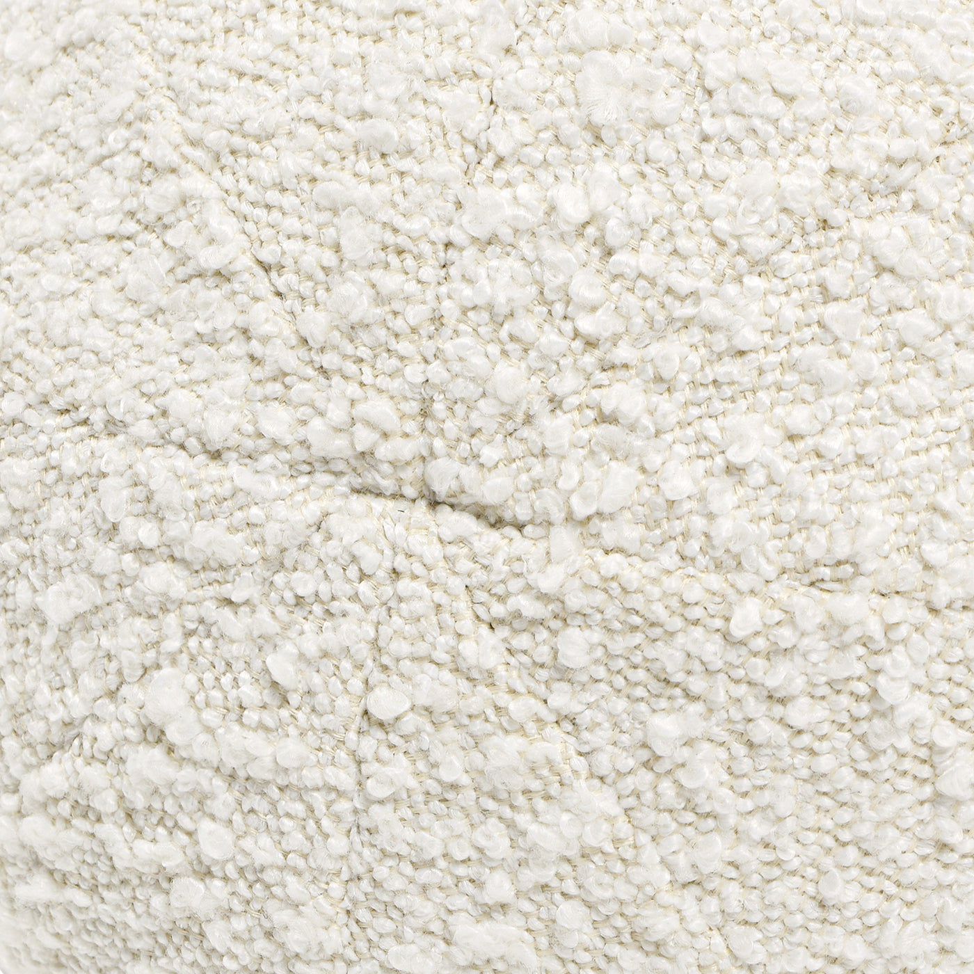 Closeup of a textured ivory boucle fabric ideal for upholstery