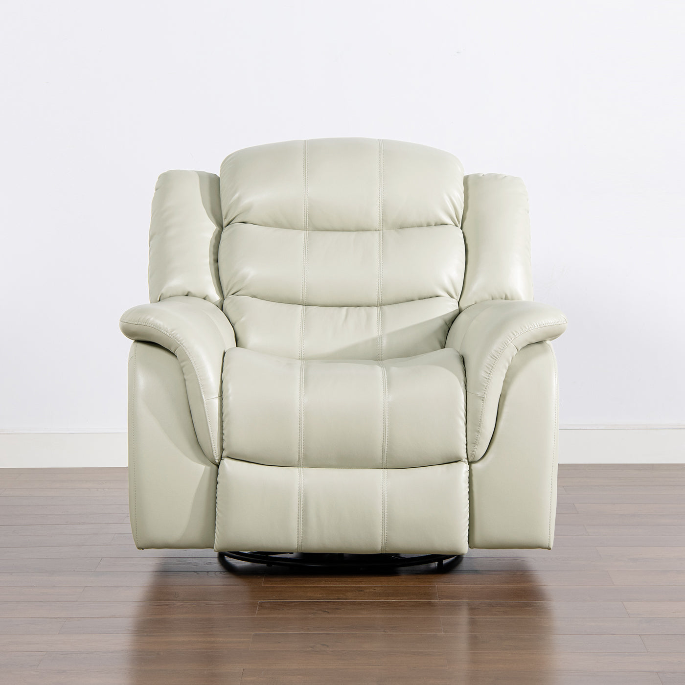 Light beige leather recliner with padded seat and back featuring plush armrests