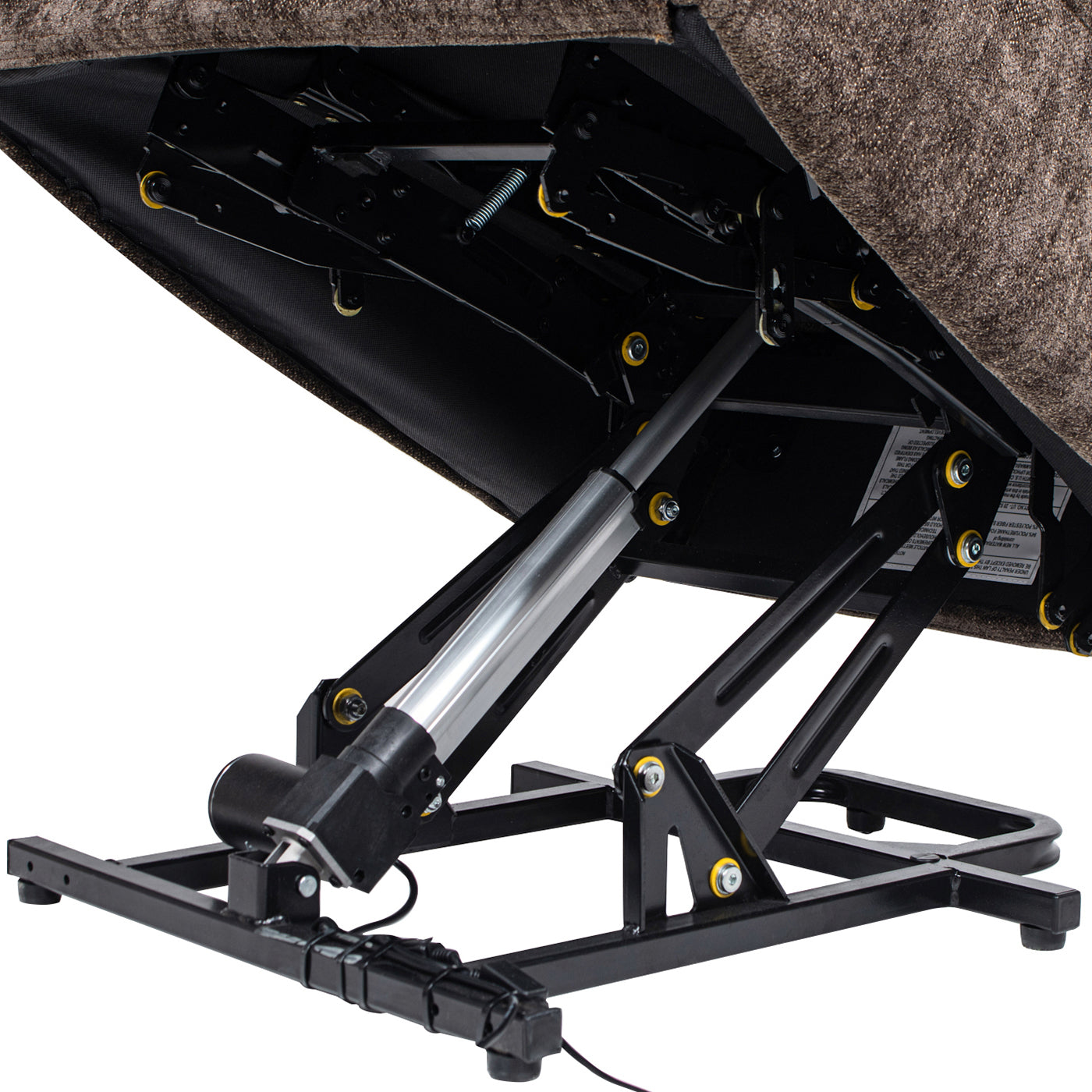 Closeup of a recliner chairs power lift mechanism showcasing its motor and metal frame