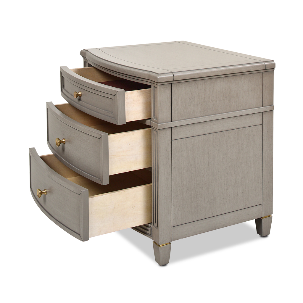 Gray wood nightstand with three open drawers and brass hardware