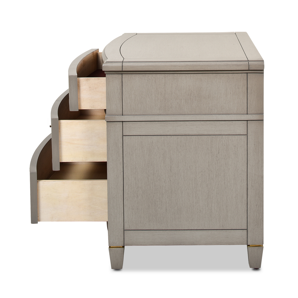 Gray wood dresser with three open drawers brushed nickel pulls