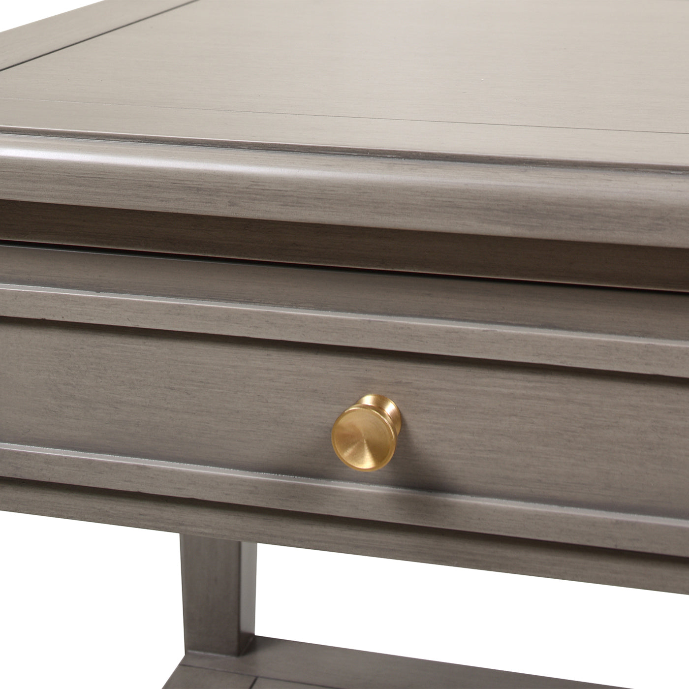 Grey wood side table with a single brass knob on a drawer