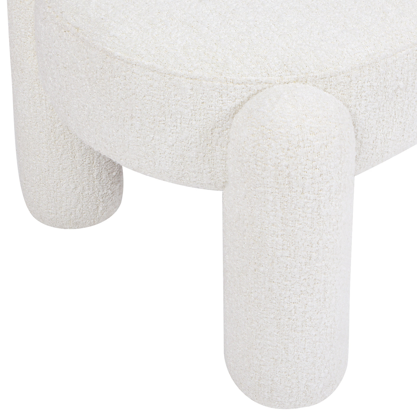 Closeup of a round cream boucle fabric ottoman with rounded legs on a white background