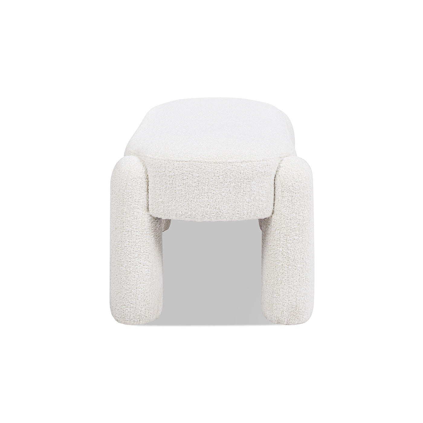 White boucle fabric ottoman with rounded legs minimalist accent seating