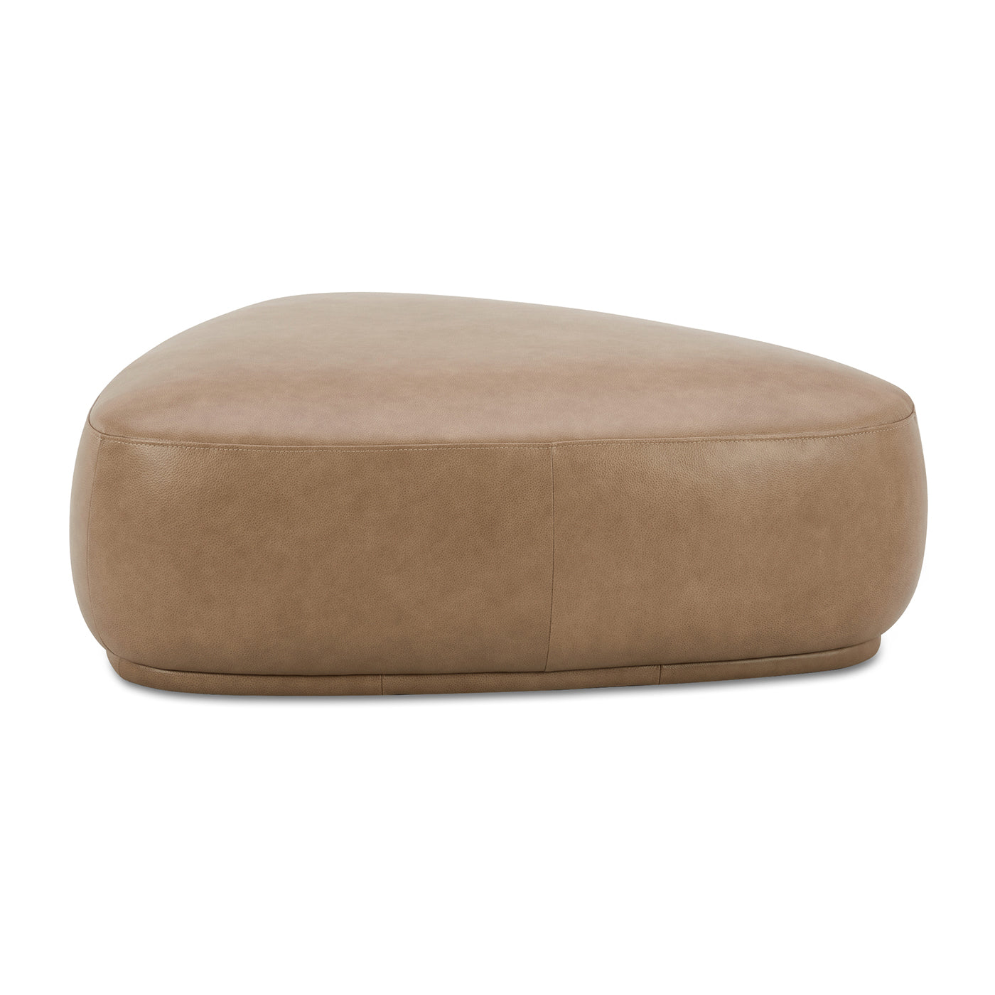 Tan leather ottoman with curved sides and subtle stitching detail