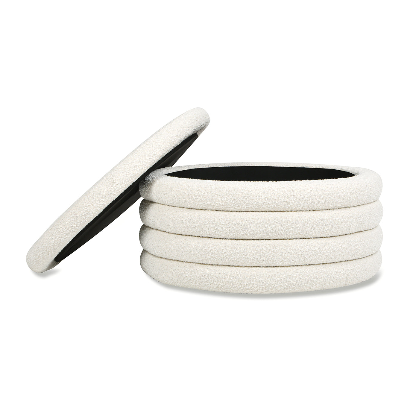 Stack of five plush ivory coasters with black backing