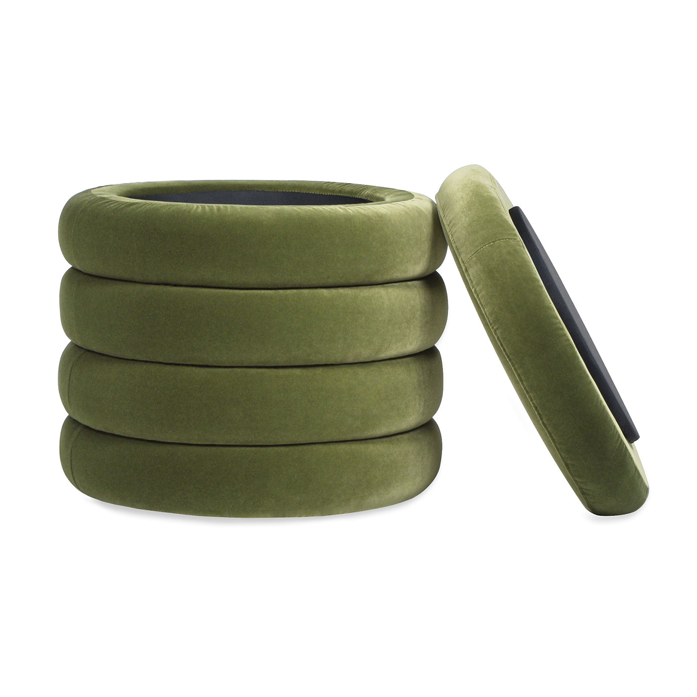 Stack of four green velvet floor cushions with one cushion leaning against them