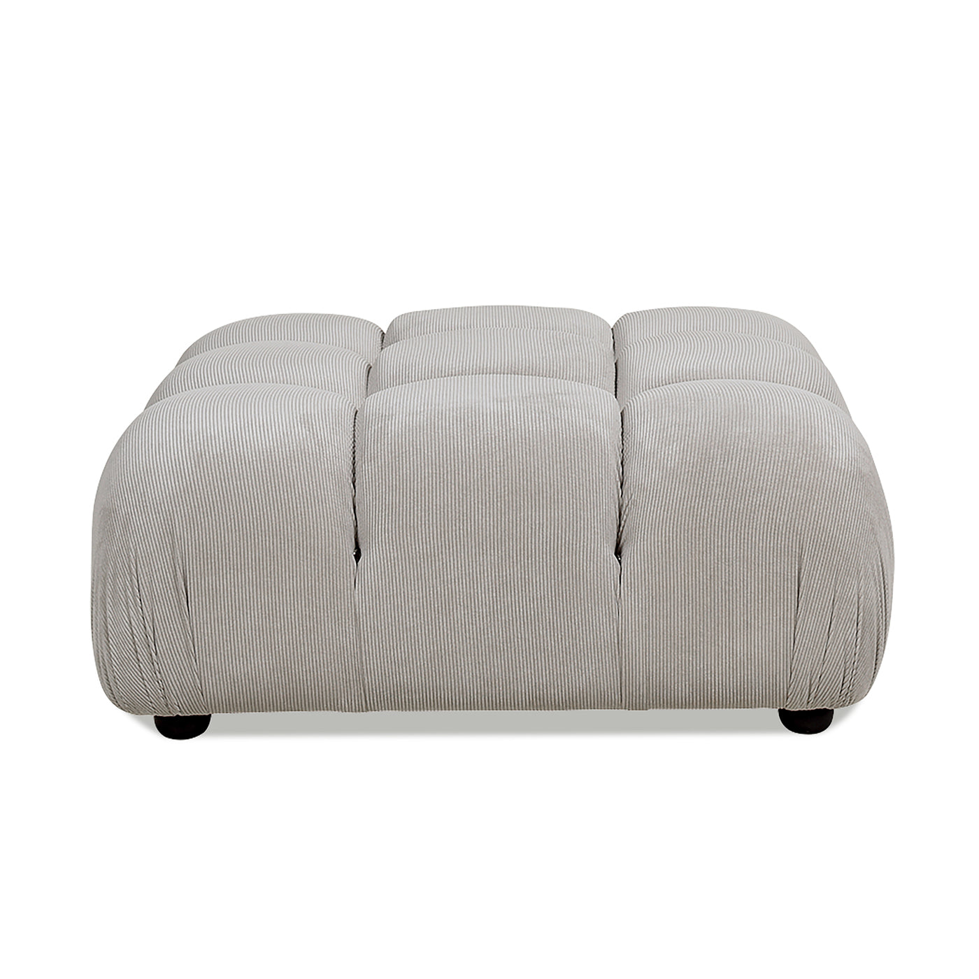 Tufted grey corduroy ottoman with plush seating and dark wooden feet