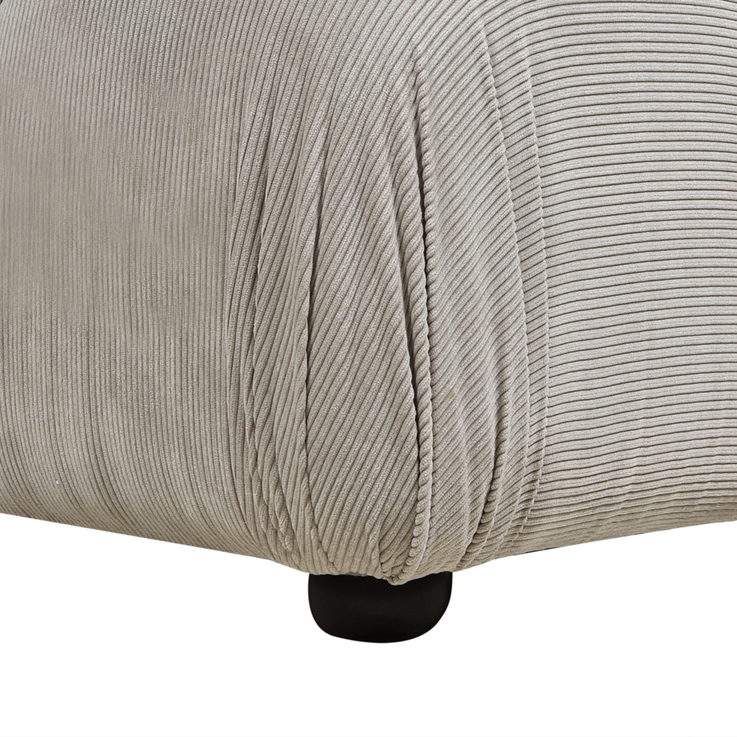 Light grey corduroy fabric texture on a rounded furniture armrest  characters