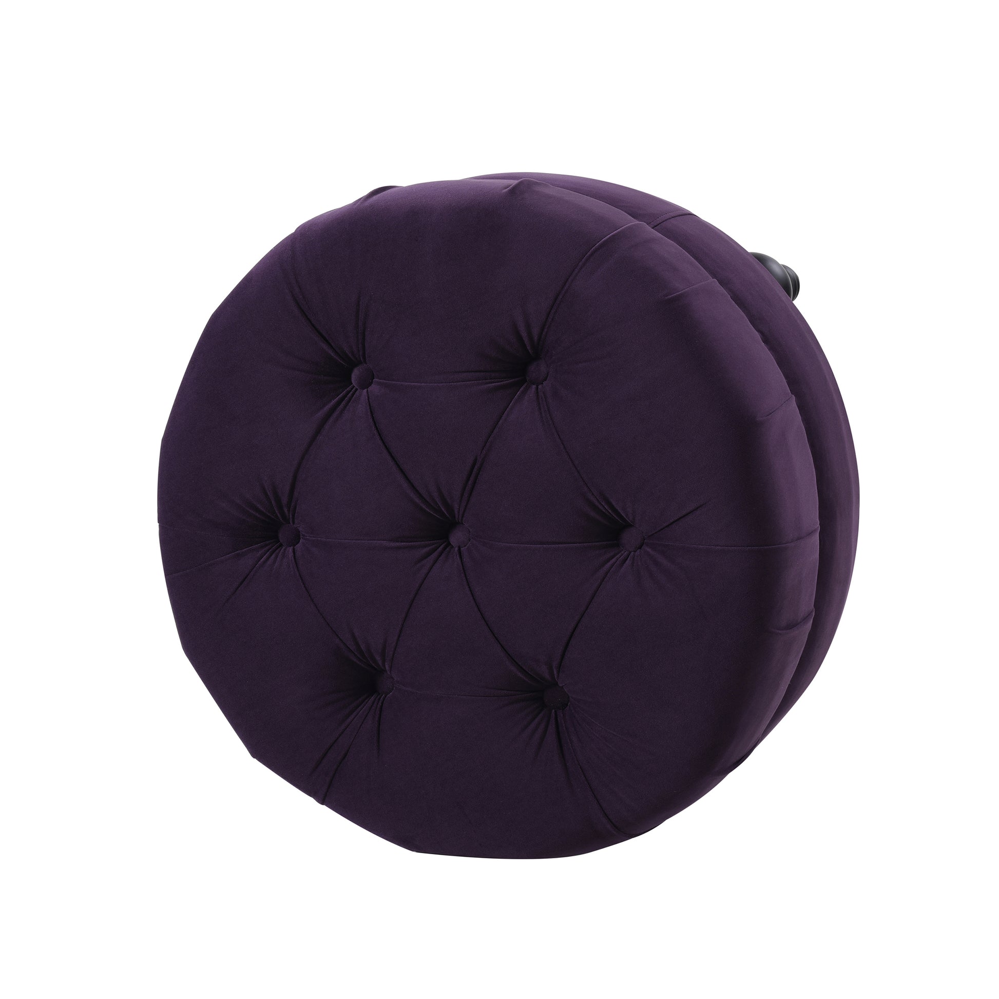 Plush velvet round ottoman in deep purple with diamond tufting detail