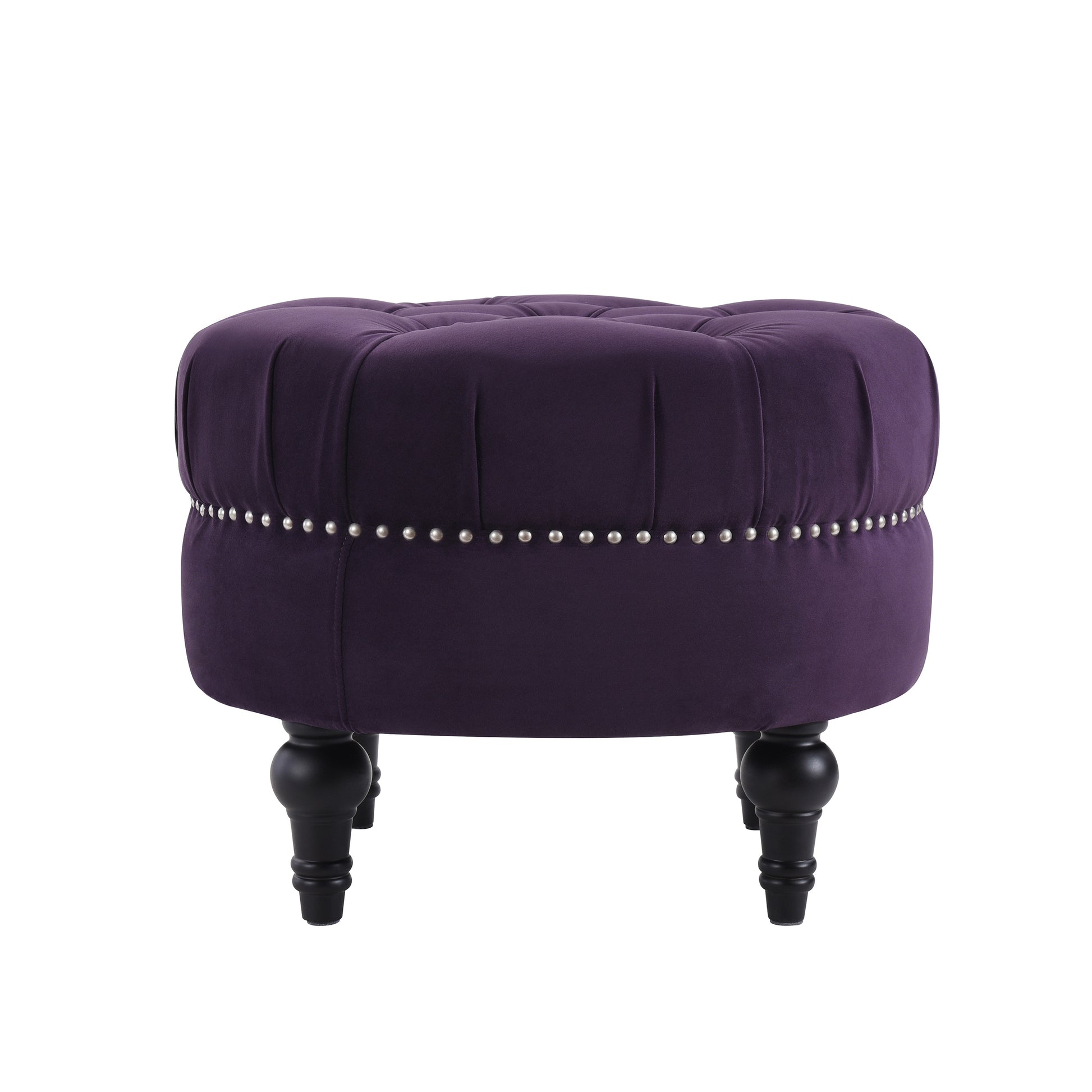 Deep purple velvet ottoman with button tufting and silver nailhead trim