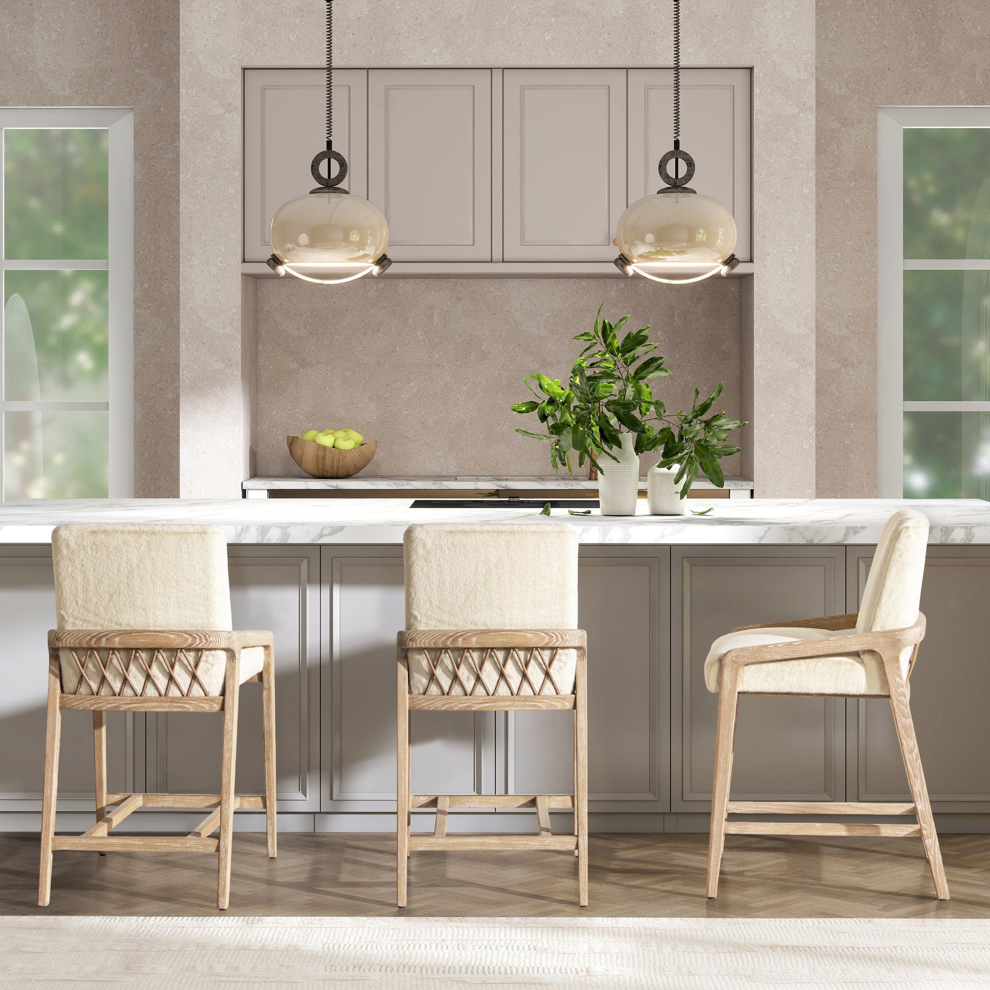 Three cream boucle upholstered bar stools with natural wood frames