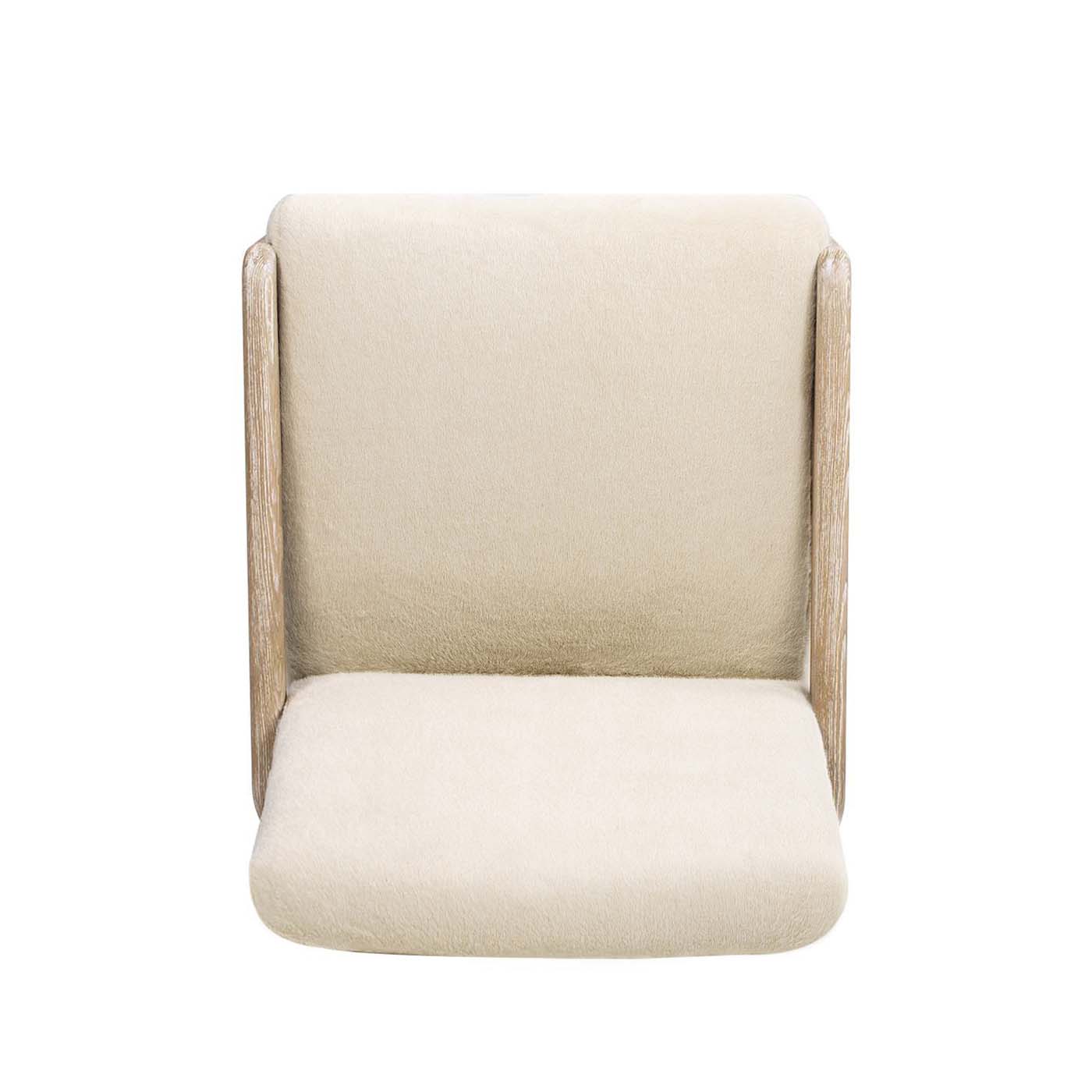 Cream boucle dining chair with light wood frame and plush seat
