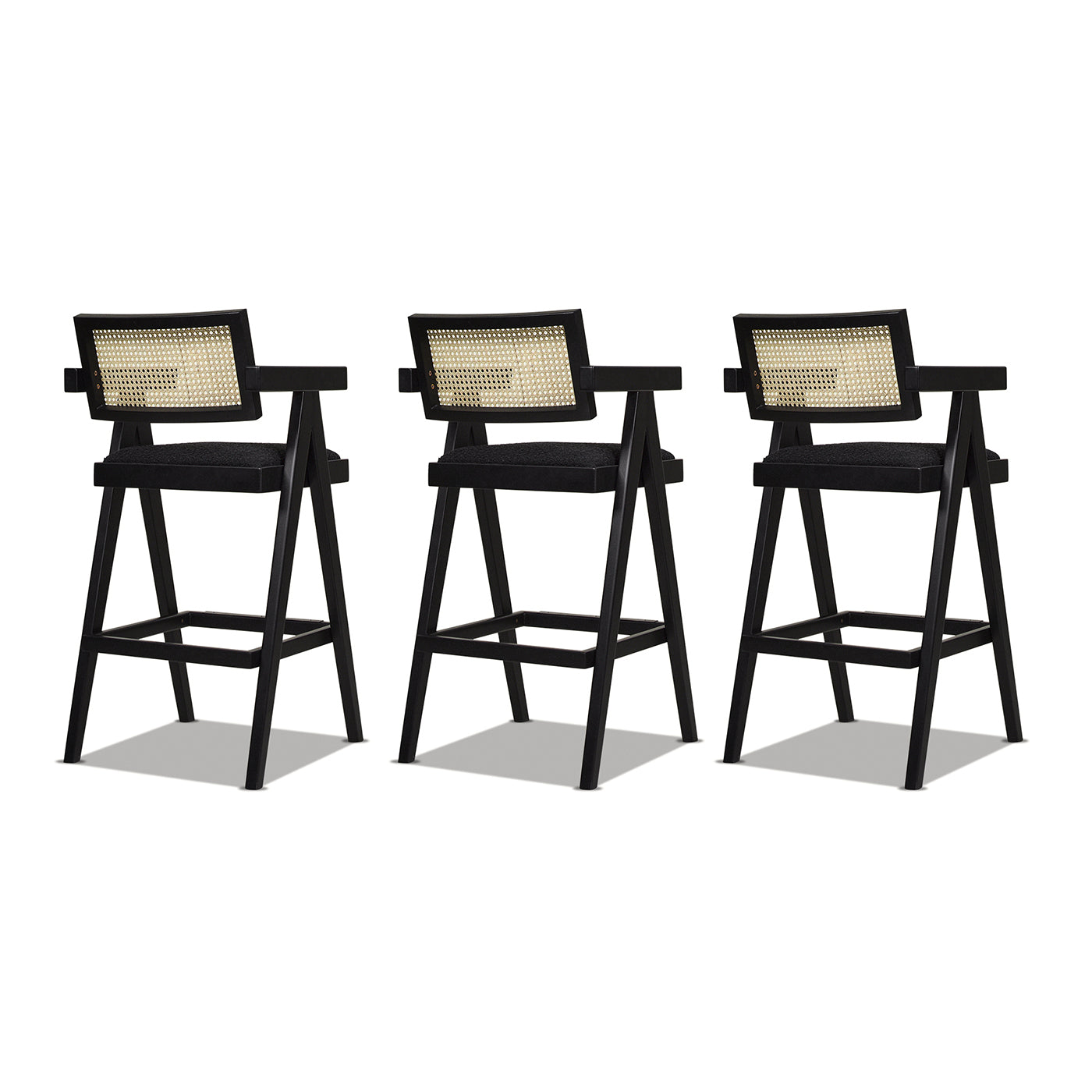 Black wooden bar stool with woven cane back and upholstered seat