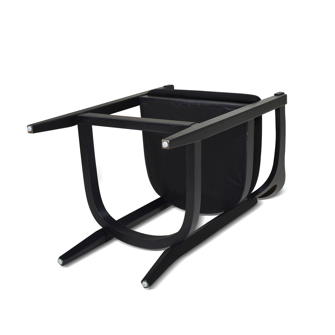 Black bentwood dining chair with upholstered seat viewed upside down
