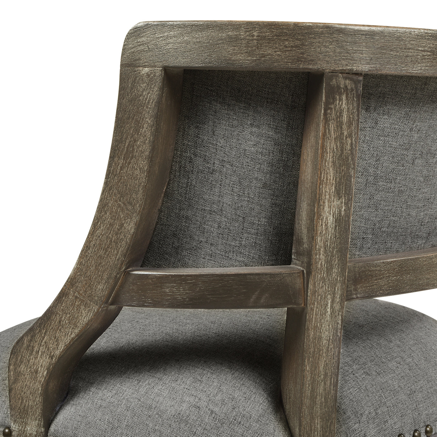 Closeup of antique gray wooden armchair back with grey fabric upholstery
