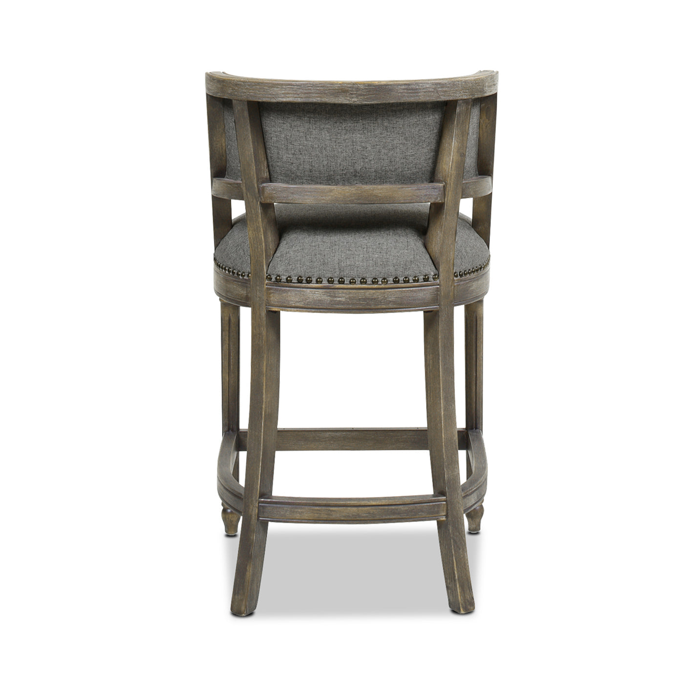 Back view of a grey upholstered wooden bar stool with nailhead trim