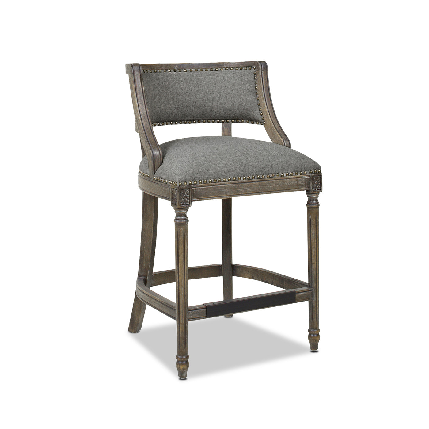 Classic grey upholstered bar stool with distressed wood frame and brass nailhead trim